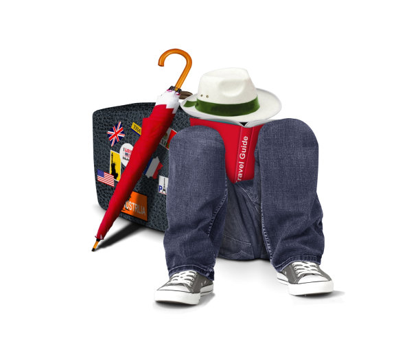 度假的男人在看旅游指南图片下载