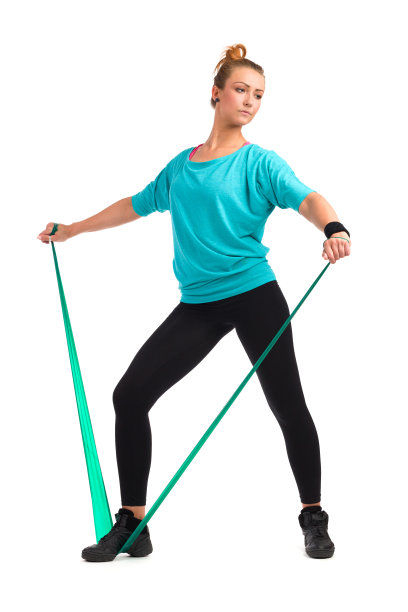 女性运动与乳胶拉伸带图片下载