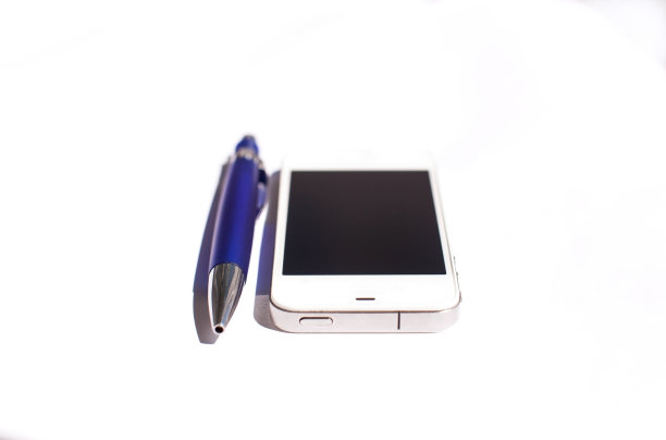 蓝色钢笔和电话图片下载