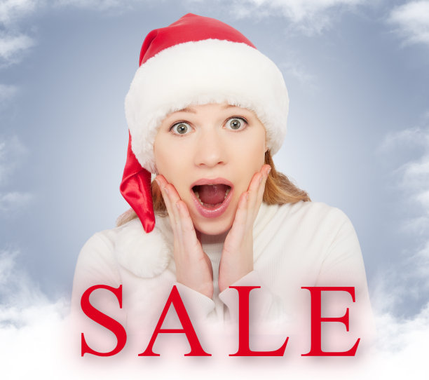 圣诞特卖，快乐的年轻女子图片下载