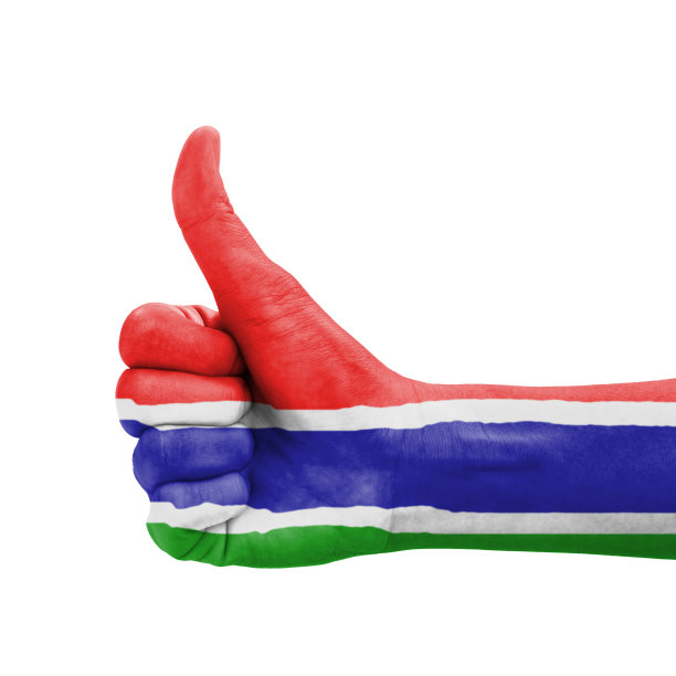 手竖大拇指，涂上冈比亚国旗图片下载