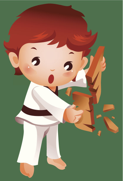 男孩用空手道打破了一块板图片下载