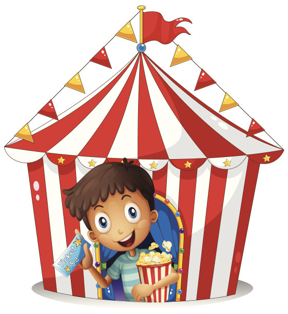 小男孩拿着票和爆米花在帐篷附近图片下载