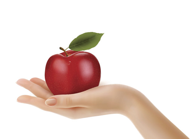 手里拿着成熟的红苹果。图片下载