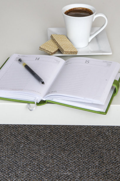 一杯茶和笔记本图片下载