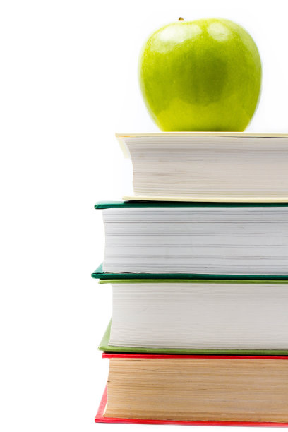 教室里的学习用品有书本和苹果图片下载