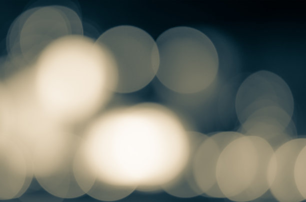 抽象的蓝色散景背景。图片下载