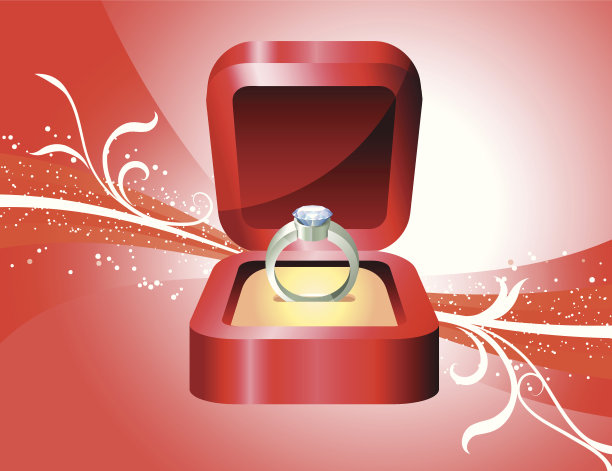 钻石订婚戒指在红色的花背景图片下载