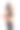 穿着蓝色牛仔裤和上衣的年轻漂亮女人图片下载