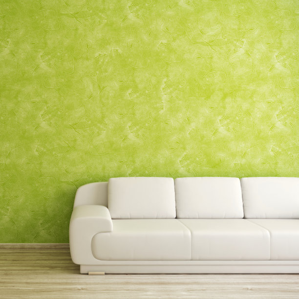 现代室内与绿色灰泥墙附近的白色沙发图片下载