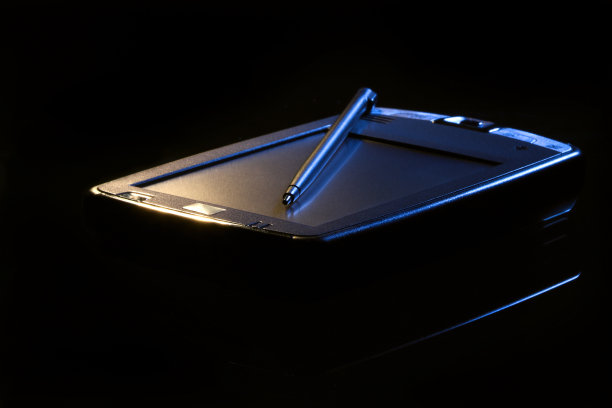 PDA在光束中。黑色背景。图片下载