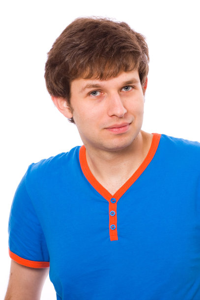 身穿蓝色衬衫的年轻男性，孤立的肖像，积极自信图片下载