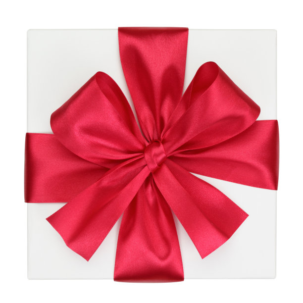 在礼物上鞠躬。图片下载