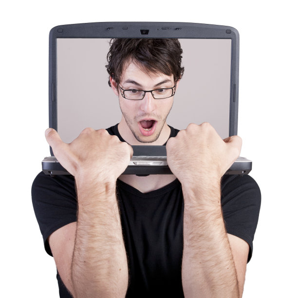 无头人在笔记本键盘上打字图片下载