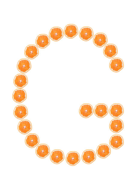 信“G"从白色背景上分离出来的橙色薄片中图片下载