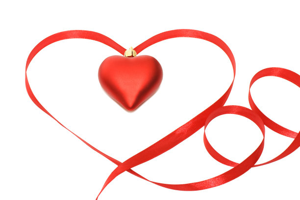 白色背景下孤立磁带上的心脏素材图片