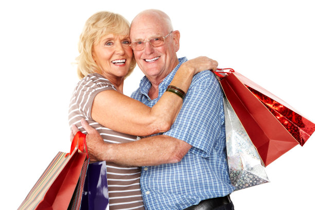 带着购物袋的老年夫妇-孤立图片下载