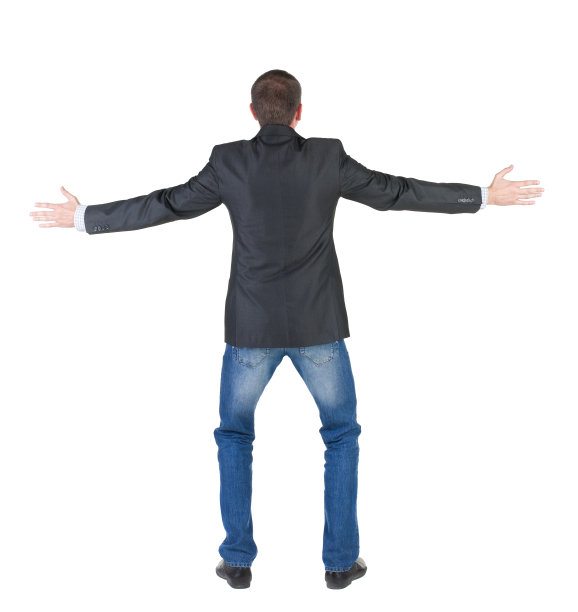 后视图的震惊和害怕的年轻商人。图片下载