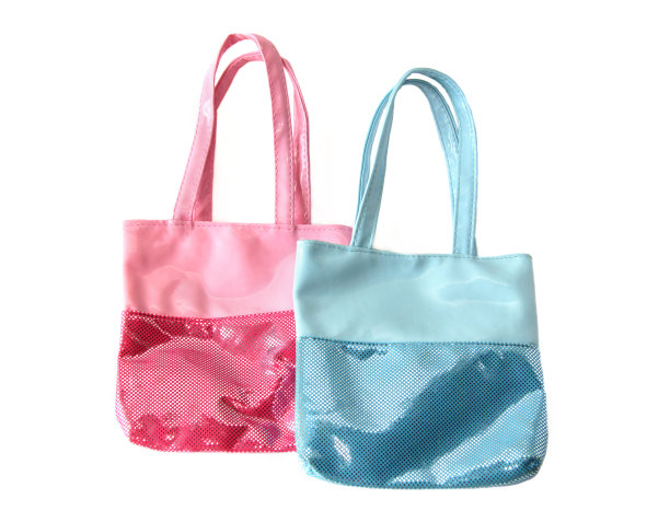 两个白色背景上有亮片的儿童包图片下载