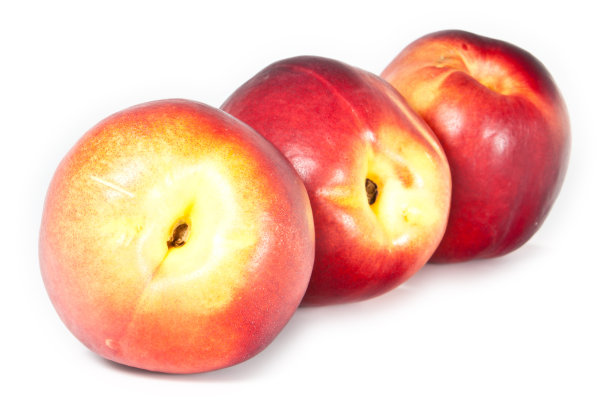 三个油桃排成一排图片下载