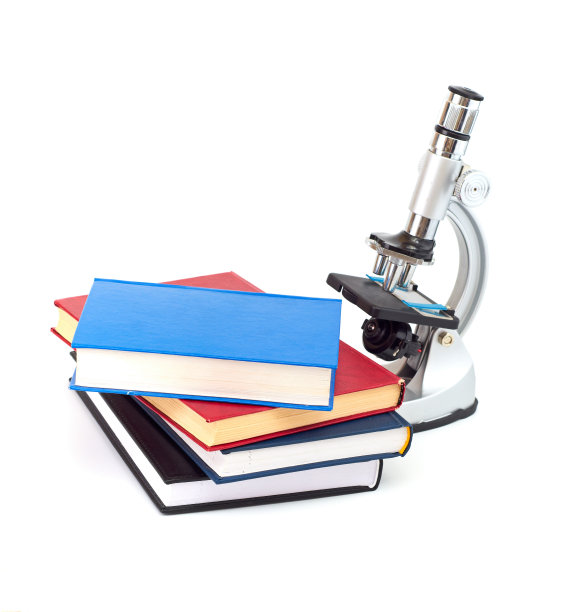 显微镜下，书本孤立在白色上图片下载