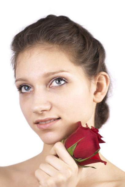 带着红花的年轻漂亮的女人图片下载