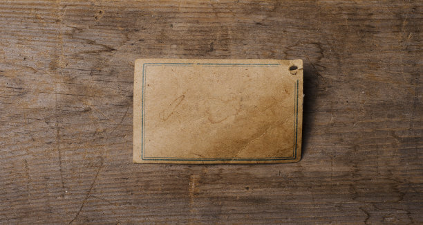 旧木头上的老式标签图片下载