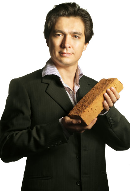 年轻建筑师与砖图片下载