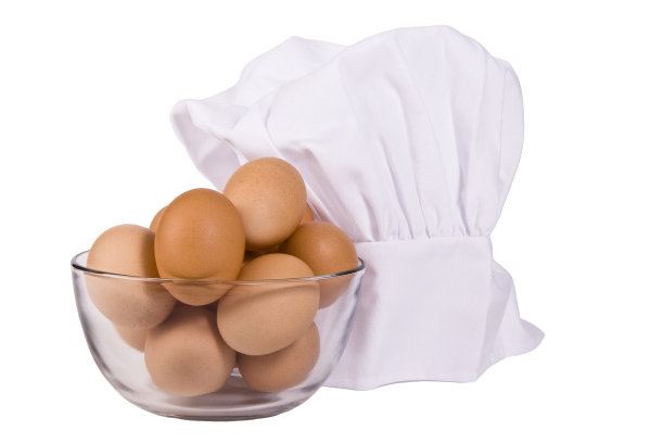 棕色鸡蛋和厨师帽图片下载