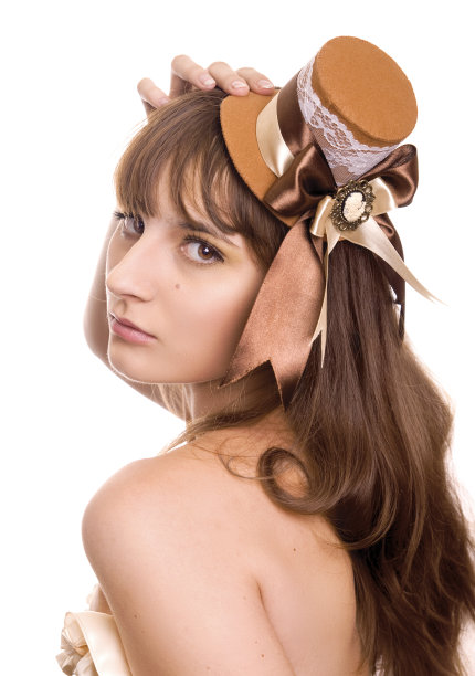 戴迷你帽子的女人图片下载
