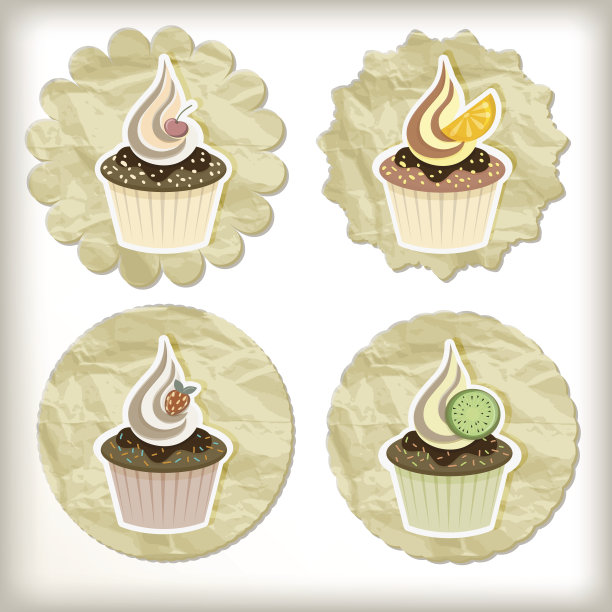 金色餐巾上的矢量纸杯蛋糕图片下载