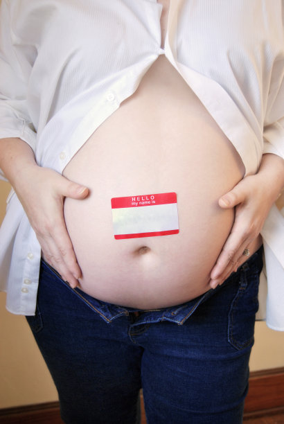 孕妇腹部肖像与空白名牌图片下载