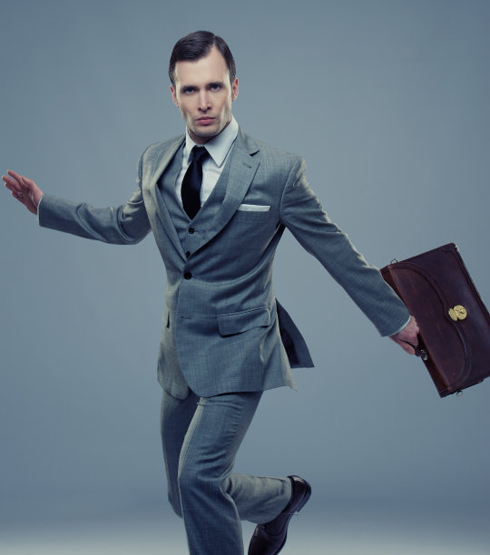 带着公文包的商人被孤立在灰色地带图片下载