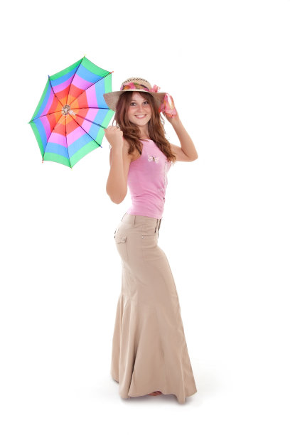 漂亮的女孩戴着帽子，带着五颜六色的伞图片下载