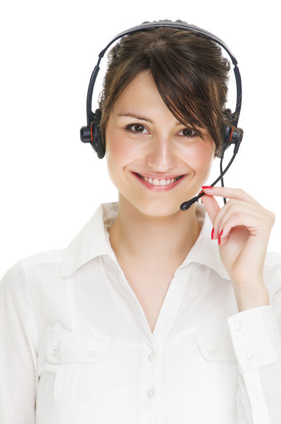美丽微笑的呼叫中心女人与耳机隔离在白色图片下载