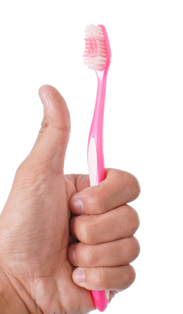 粉色牙刷的大拇指图片下载