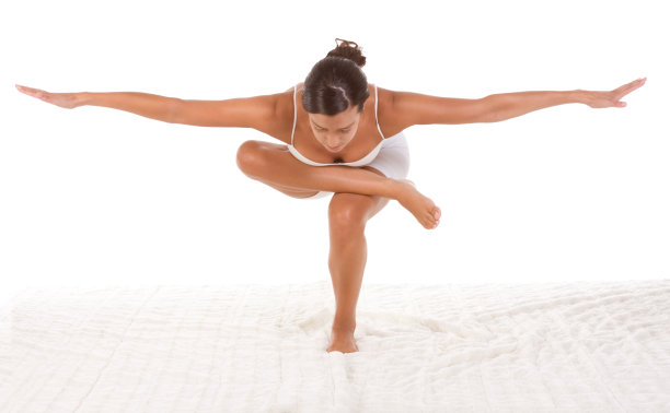 瑜伽姿势-女性在运动服装进行锻炼图片下载