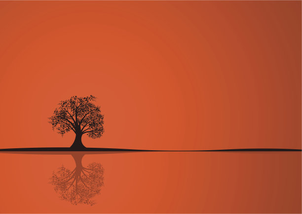 橙色的背景和一棵黑色的树图片下载