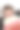一个从爆米花桶里抬头看的男人。图片下载