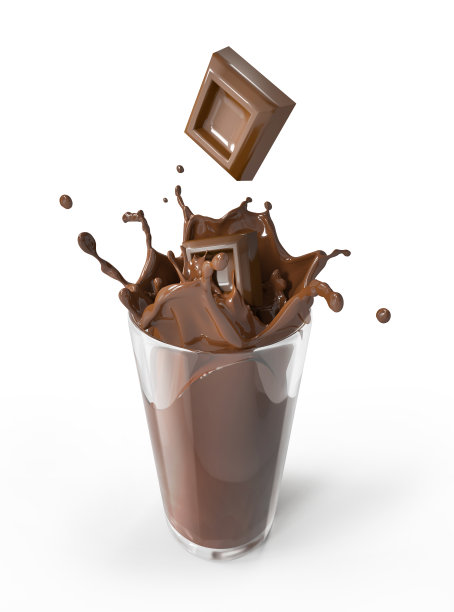 巧克力块掉进玻璃杯里溅起水花。图片下载