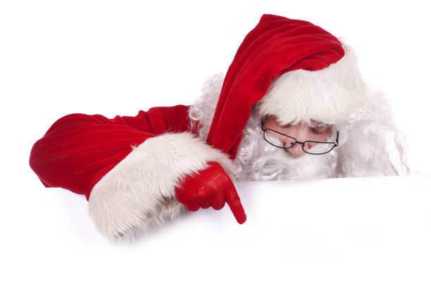 圣诞老人指着空白的文字标志图片下载