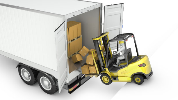 黄色的叉车从拖拉机拖车上掉下来图片下载