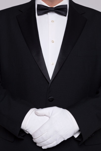 穿着燕尾服戴着白手套的男人。图片下载