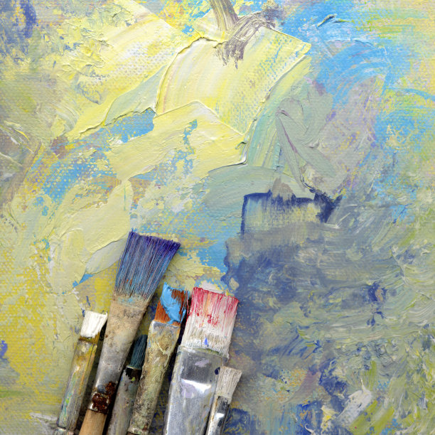 把画笔放在艺术品上图片下载