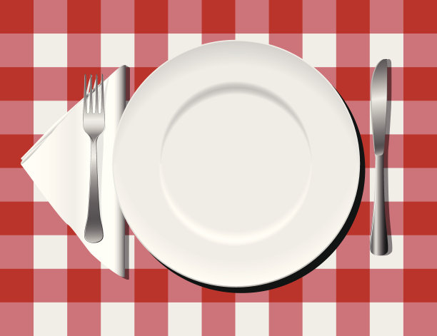 餐具放在方格桌布上图片下载