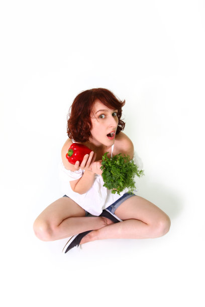 惊讶的年轻女子蔬菜图片下载