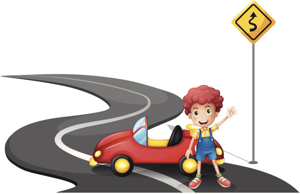 一个小男孩和他的车在一个黄色标志附近图片下载