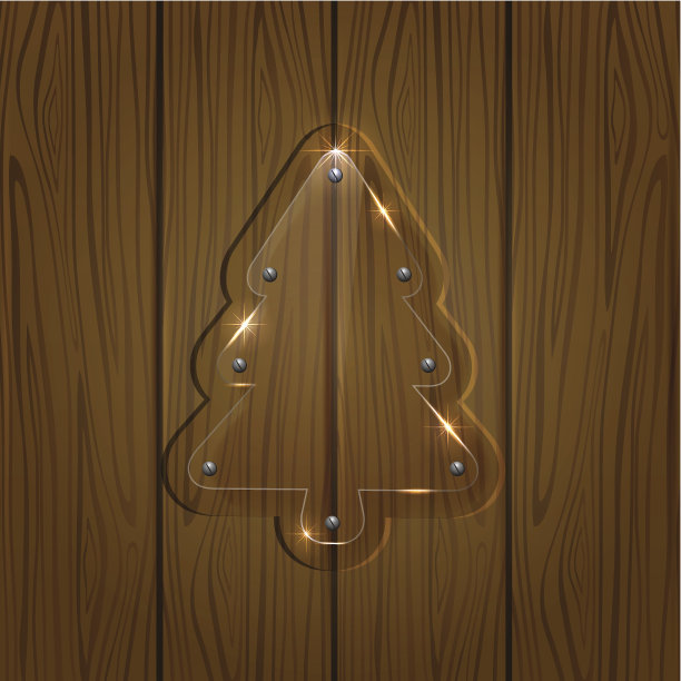 木制背景上的玻璃圣诞树图片下载