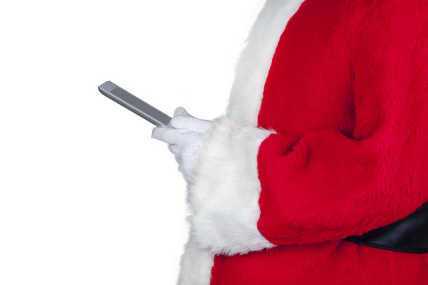 圣诞老人拿着平板电脑图片下载