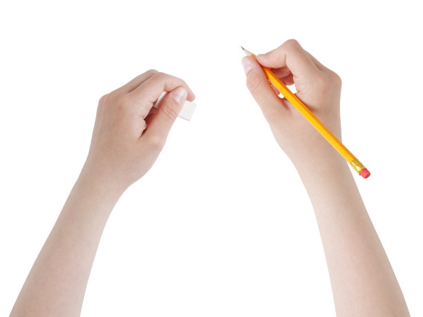 女性青少年的手与铅笔和橡皮擦图片下载